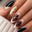 Black brown gold floral almond press-on nails worn on hand