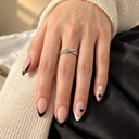 Matte black French heart almond press-on nails — hand
