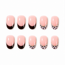 Black and leopard French short oval press-on nails – ten nails on white