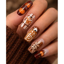 Brown orange autumn square press-on nails worn on hand