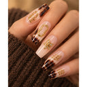 Brown tortoiseshell gold square press-on nails worn on hand