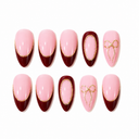 Burgundy French gold frame and bow almond press-on nails — ten-nail set
