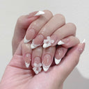 White French pearl and bow almond press-on nails — supplier design reference