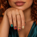 Teal pumpkin tartan and maple short square press-on nails — worn on hand