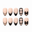Black outline French bow and crystal almond press-on nails — ten-nail set