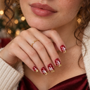 Ruby red gold glitter snowflake square press-on nails — worn on hand
