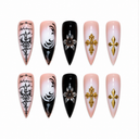 Black gothic filigree and gold cross stiletto press-on nails — ten-nail set
