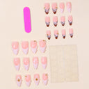 Blush French almond nails with black linework, flowers and gold accents – supplier