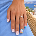 Beach shell French square nails worn with a silver ring