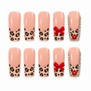 Leopard French long square nails with red bow and crystal accents