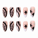 Black scale and star almond nails with nude bases and white French tips