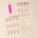 Original supplier image of silver glitter bow and heart almond nails