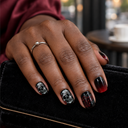 Black skull and red rose square nails worn with burgundy silk and black velvet