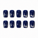 Navy short square nails with delicate white sprigs and small flower clusters