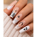 Nude white Halloween coffin press-on nails worn on hand