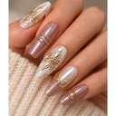Mauve gold floral square press-on nails worn on hand