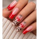 Red cherry leopard coffin press-on nails worn on hand