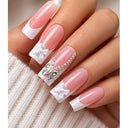 Pink white bow rhinestone coffin press-on nails worn on hand