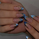 Metallic blue French and gold wave almond nails — supplier