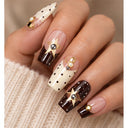 Chocolate cream polka dot square press-on nails worn on hand