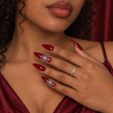 Wine red white spiderweb stiletto nails — hand