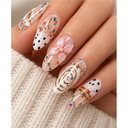 Nude pink bow polka dot nail art almond press-on nails worn on hand