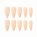 Ten glossy peach nude tapered coffin press-on nails aligned on white