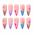 Ten pink blue and lilac floral stiletto nails with striped tips and shell accents
