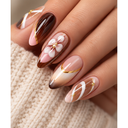 Pink brown floral gold almond press-on nails worn on hand