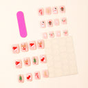 Pink Christmas icons short square press-on nails – original supplier design