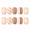Ten rose gold glitter and nude short square nails with white snowflakes and diagonal stripes