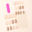 Supplier view of rose gold glitter snowflake and stripe short square nails